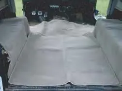 Initial test fit of the carpet kit in the vehicle.