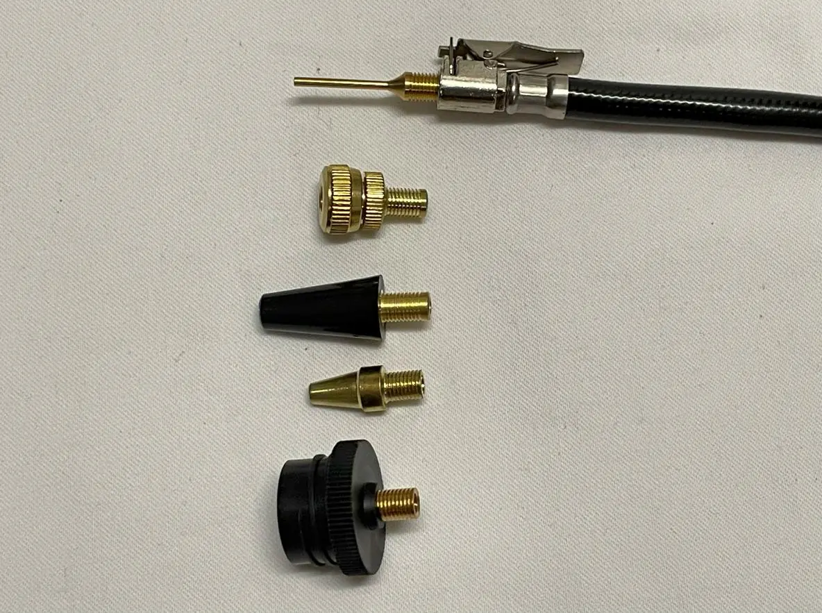 Clipping brass adapters into the black hose
