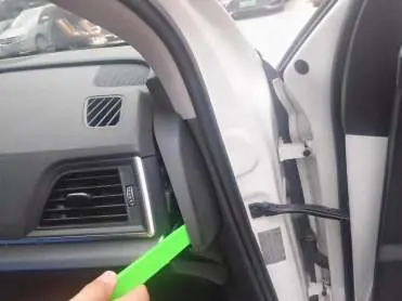Removing the right side panel with a pry bar