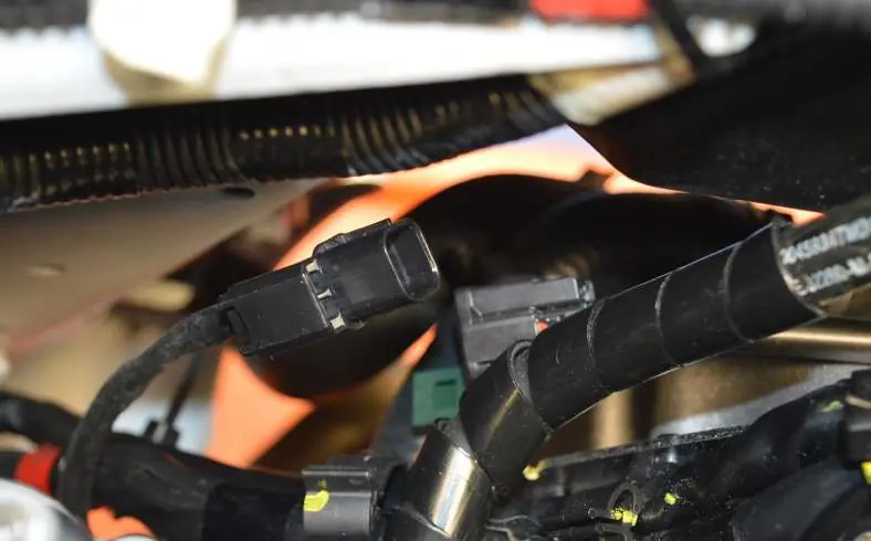 Connect the electrical wiring harness.