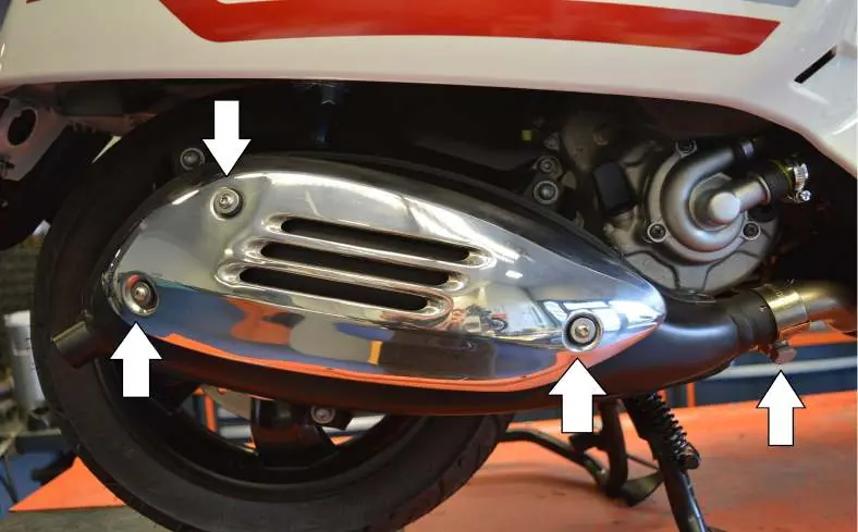 Install the heat shield cover.