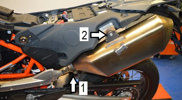 Mounting points for the silencer and link pipe connection.