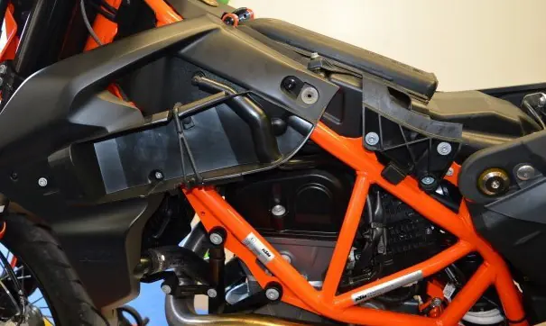 Reinstall the side body panels.