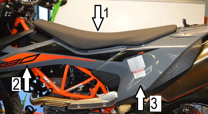 Finalize the assembly by securing the seat and side fairings.