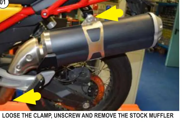 Removing the stock muffler.