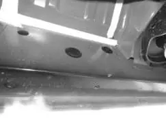 Removing rubber plugs from mounting locations