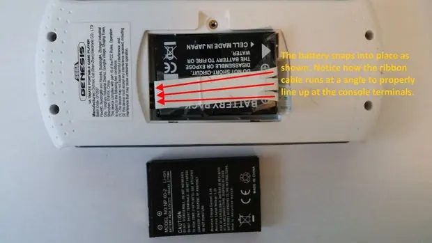Final battery installation in the console.