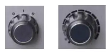 Heat control switch and thermostat knob.