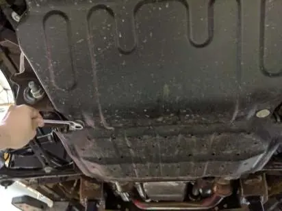 Removing the factory plastic front skid plate