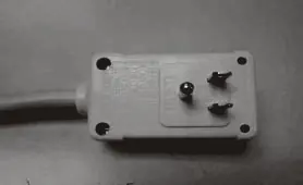 Inspect the power plug for safety features.
