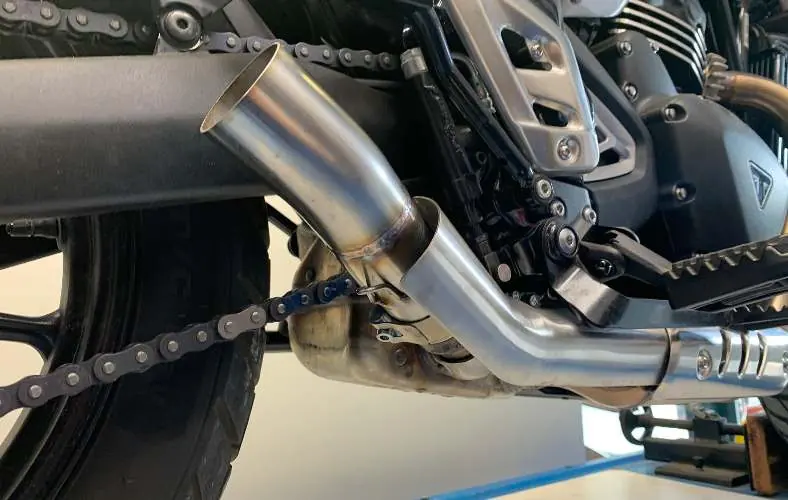 Installing the muffler and fasteners