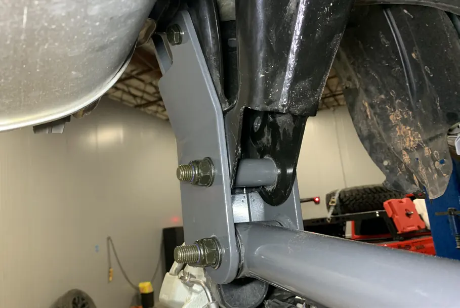 Rear roll center correction bracket installation