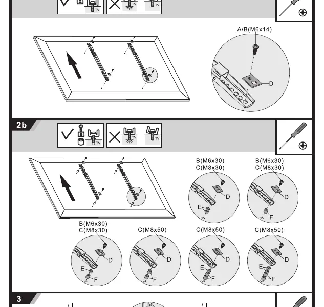 Attaching brackets to the back of the TV using screws and spacers.