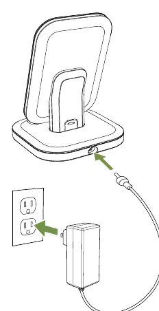 Connecting the power adapter to the stand and wall outlet.