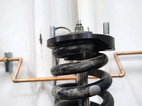 Assemble the top mount.