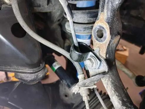 Reattach the brake line bracket.