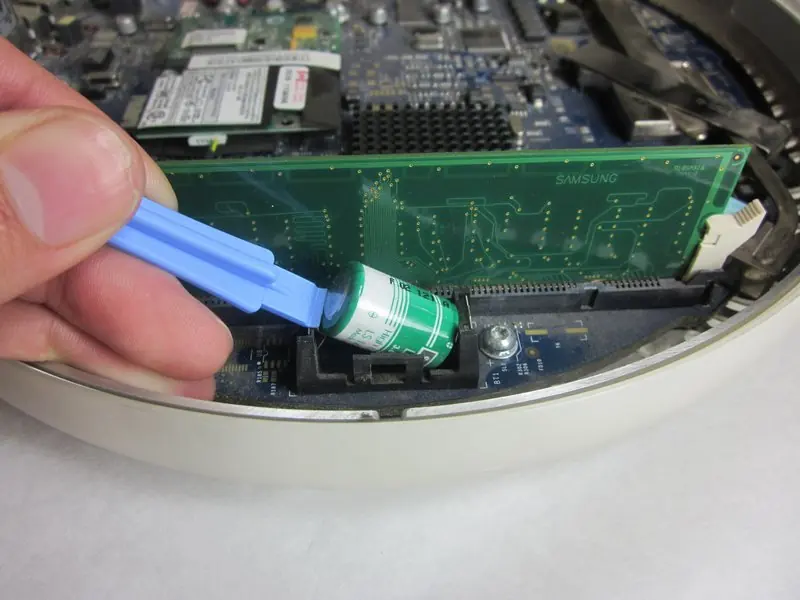 Removing the PRAM battery.