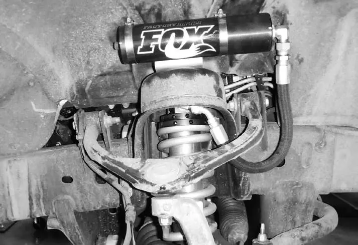 Coilover installation with remote reservoir.