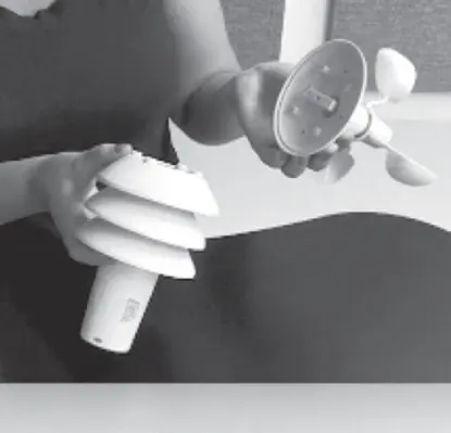 Removing the old wind cup assembly.