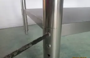 Installing legs into the base.